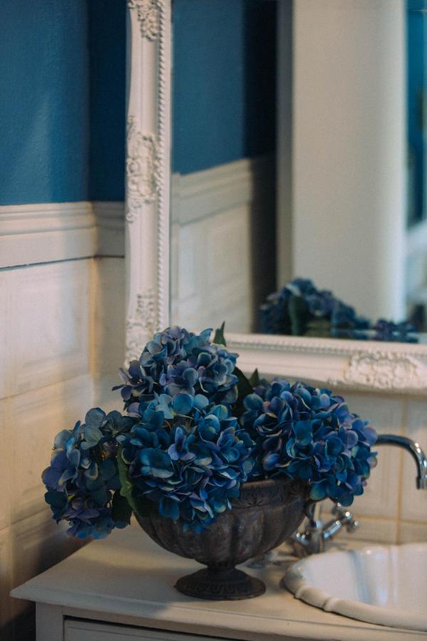 Room 3 blue hydrangeas in bathroom