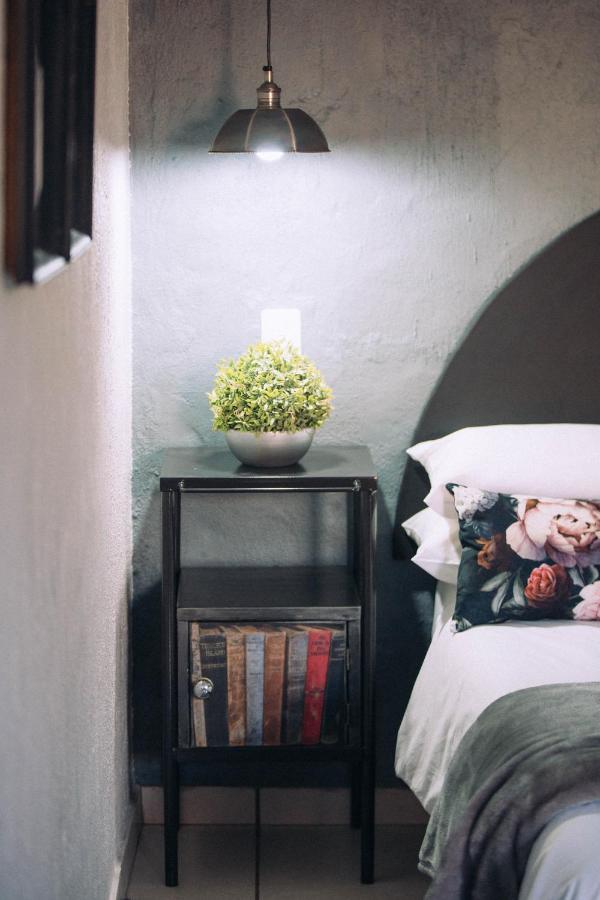 Room 4 bedside with pendant light